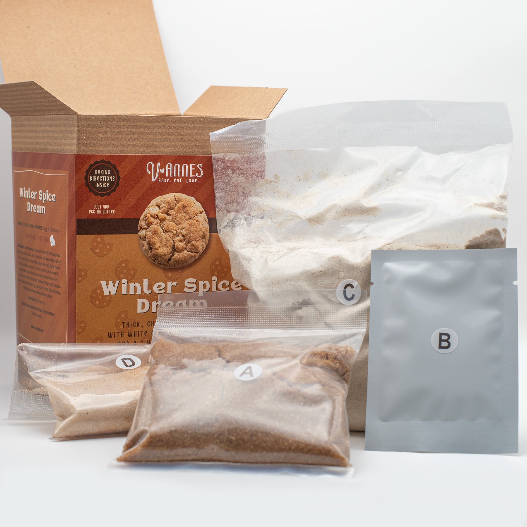 V-annes Winter Spice Dream baking mix packaging with various components on a white background